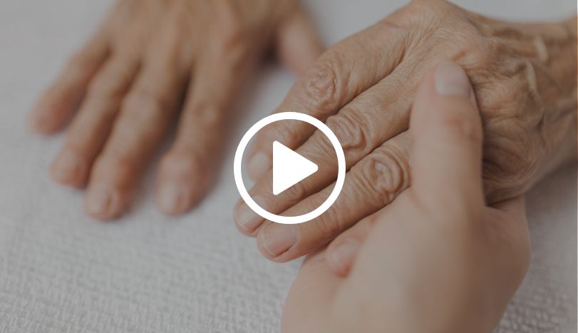 Healing care hospice worker holding hospice patient hand