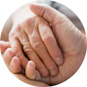 senior hospice patient holding hands with hospice worker healing care hospice